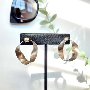 Art deco style twisted silver earrings.